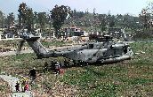 Image: Americans board a U.S. Marine Corps CH-53 Super Stallion in Tirana, Albania.