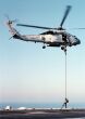 Image: Explosive Ordnance Disposal team fast rope from a SH-60B Seahawk helicopter.