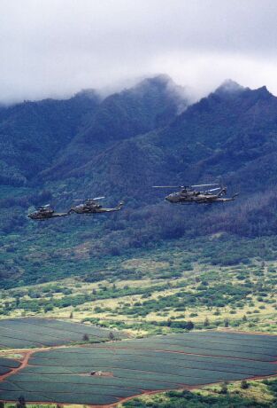 Image: AH-1Fs fly near Waianae Mountains