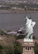 Image: A U.S. Navy SH-2 Seasprite helicopter flies by the Statue of Liberty during Fleet Week '98.